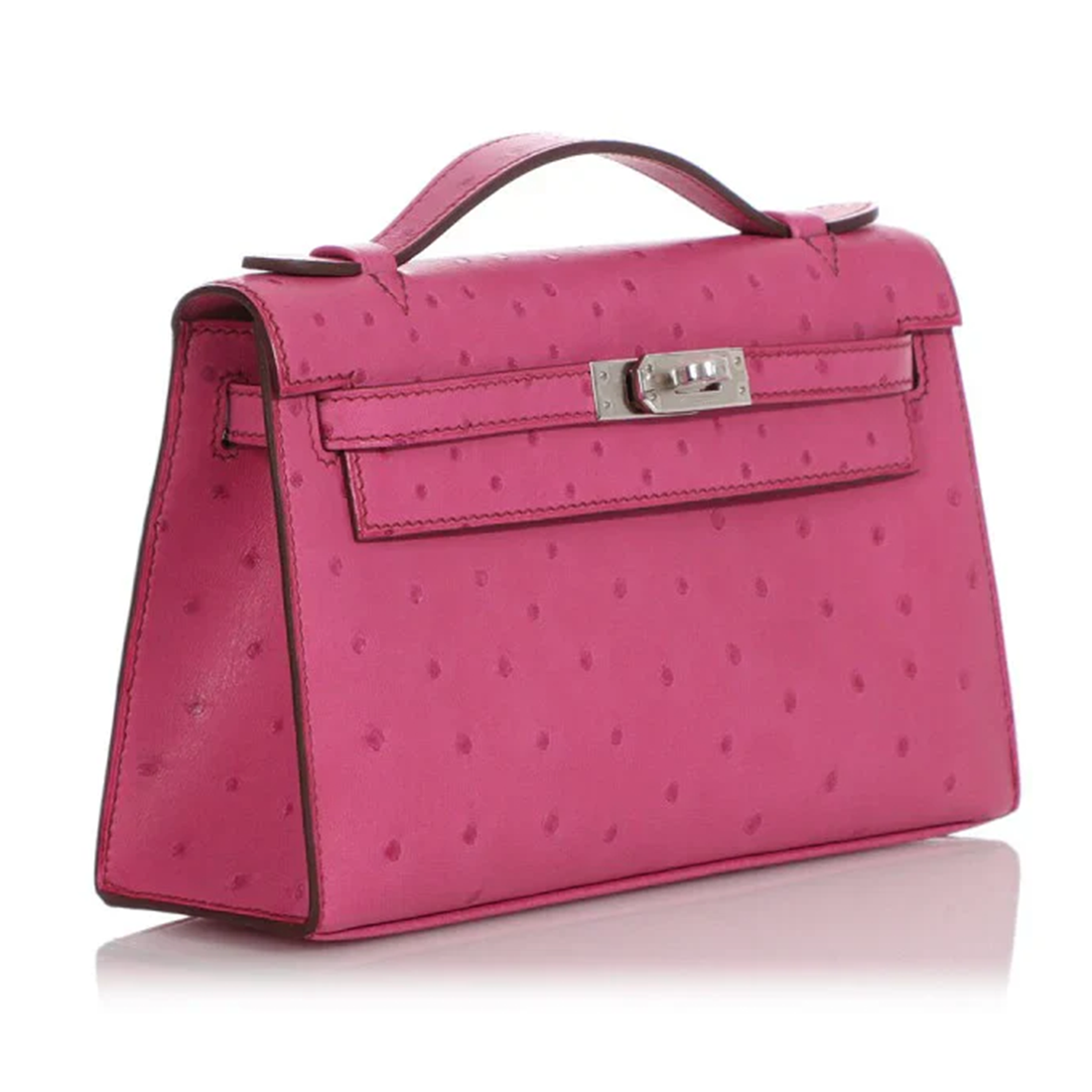 Vivid Fuchsia Pink Tiny Raised Dot Slim Horizontal Rectangular Hand Pouch With Sleek Silvery Twist Lock Hardware And Single Slim Curved Top Grip