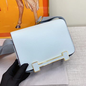 Airy Mist Blue Compact Square Box Flap Carry Bag With Distinctive H-Shaped Golden Lock Fixture And Wide Woven Fabric Strap
